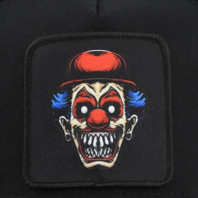 Svart keps med clown på