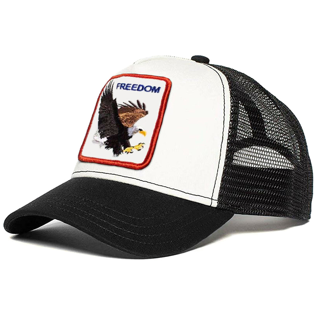 Svart- och vitfärgad trucker-keps med örn och texten freedom broderad på tygpatch