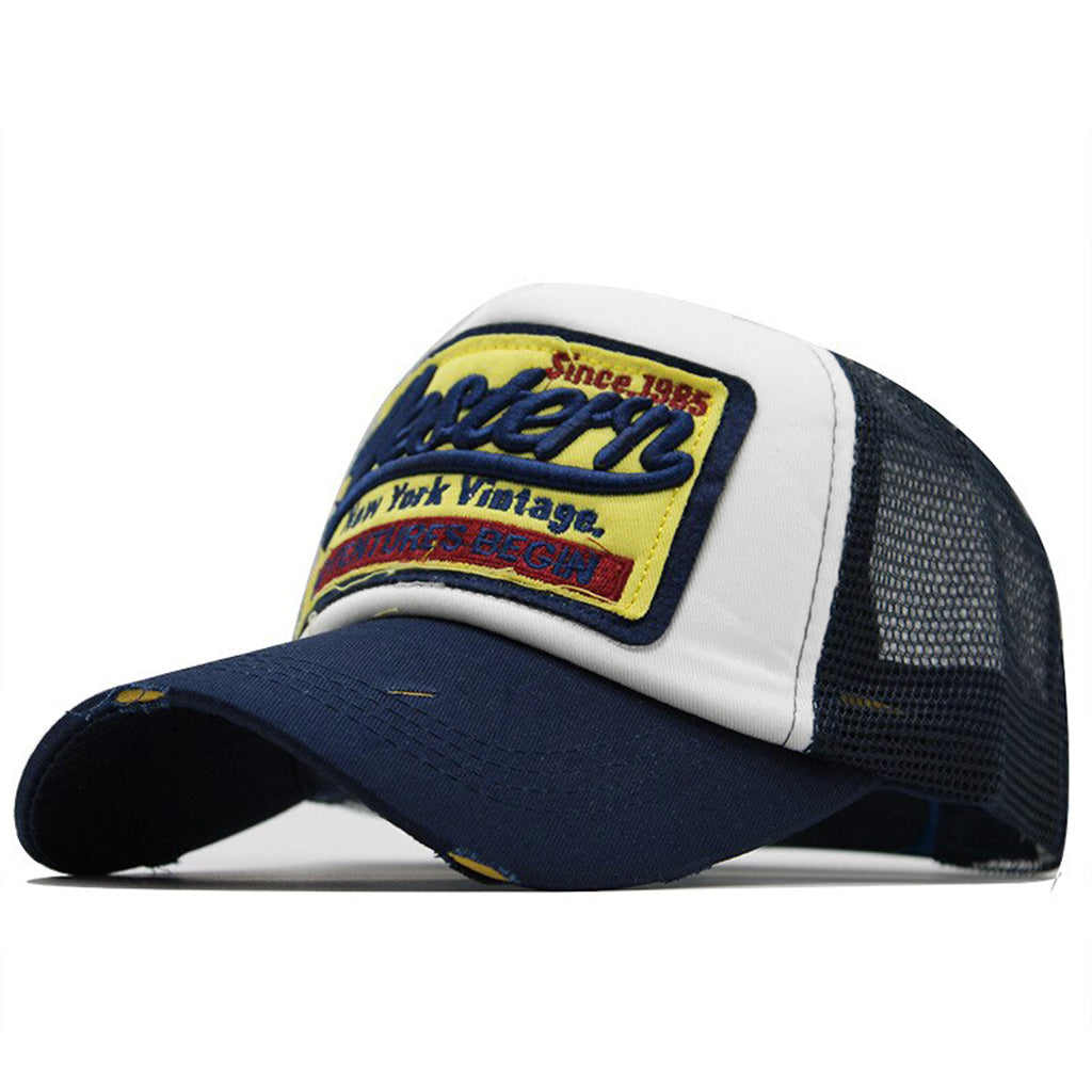 Mörkblå keps för herr med retro-brodyr på framsidan