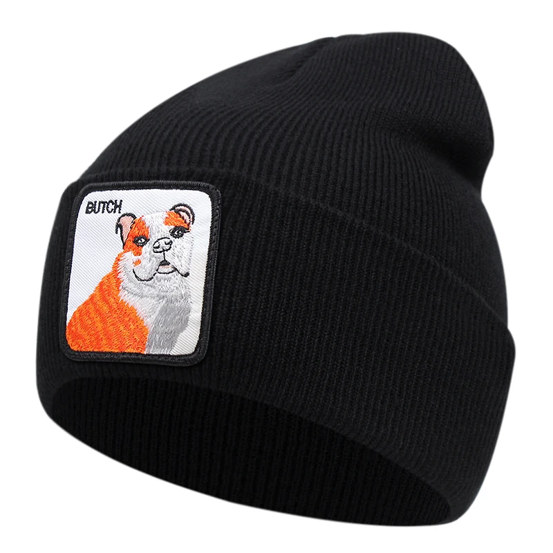 Svart mössa med bulldog och texten butch broderad på tygpatch