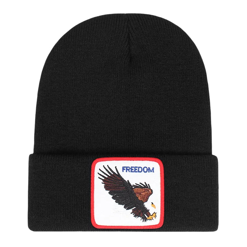 Svart mössa med örn och texten freedom broderad på tygpatch