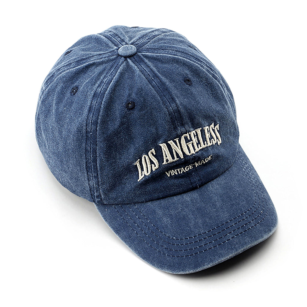Blåfärgad, stentvättad keps med LA-tryck framtill