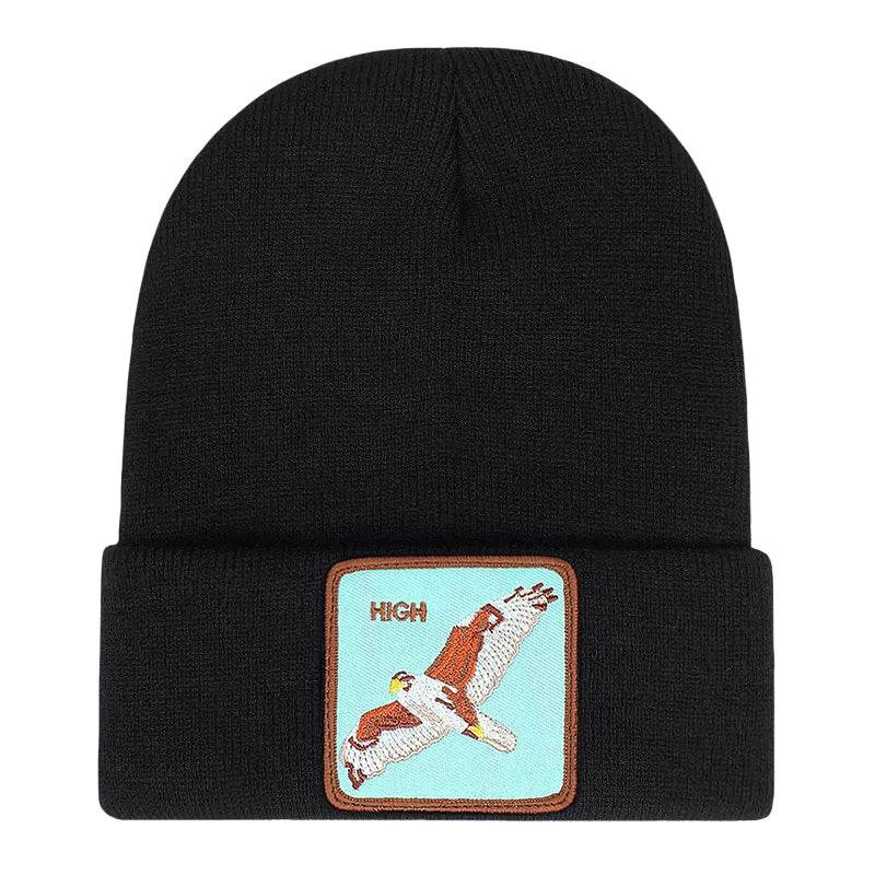 Ribbstickad svart mössa med örn på