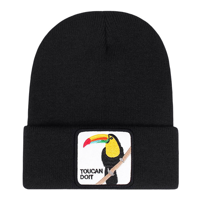 Svart mössa med tukan på framsidan
