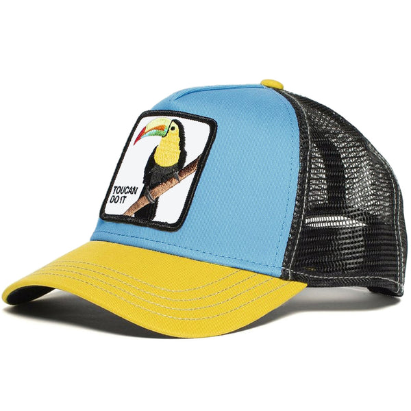 Blå- och gulfärgad keps med djur och texten toucan do it på framsidan
